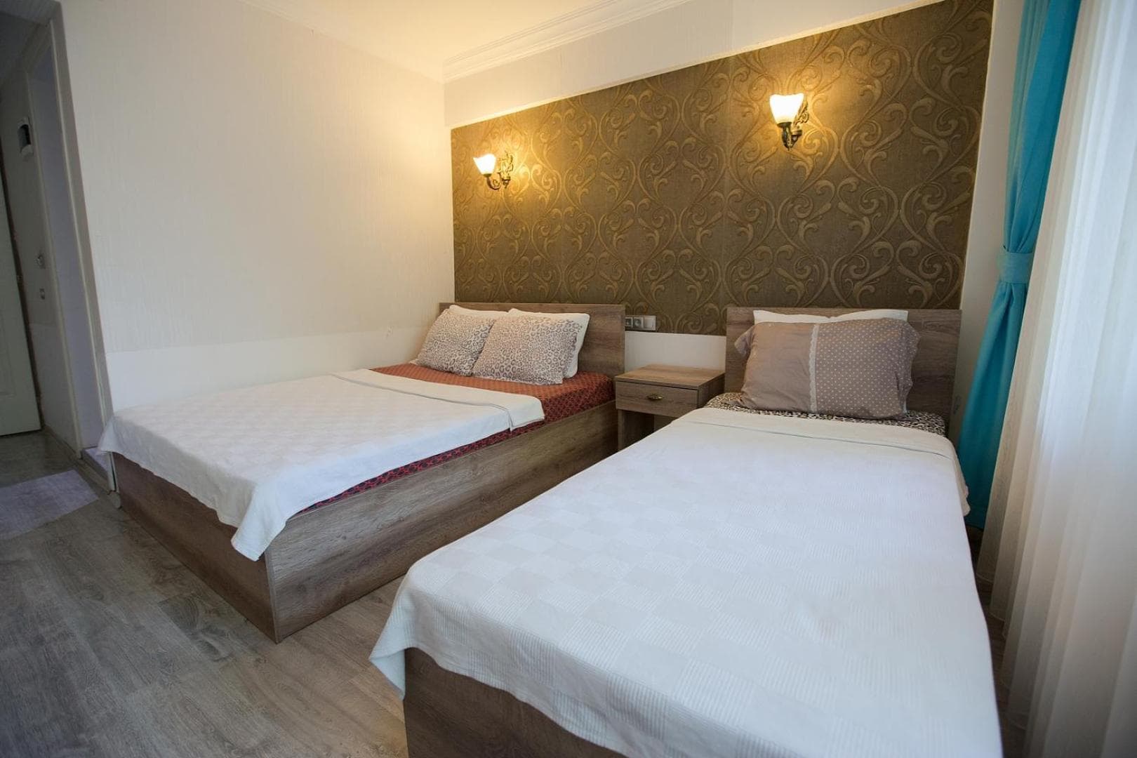 Standard Triple Room with Balcony