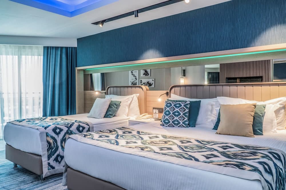 Superior Room, Multiple Beds, Non Smoking, Partial Sea View